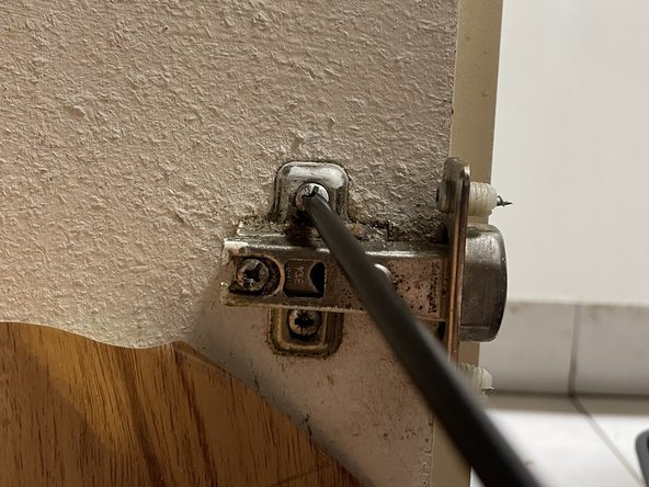 fix cabinet door hinge adjust tighten replace