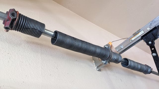 fix garage door spring torsion extension spring 2