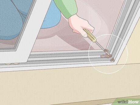 clean sliding glass door tracks remove dirt