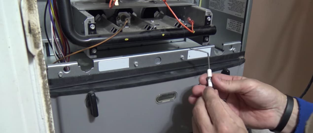 clean furnace flame sensor fix short cycling