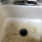 clean shine porcelain sink remove stains restore